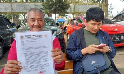 140-Ketum Cabor IBCA Kab Malang Nurcholis menunjukkan surat keberatan Wasit dan Juri Diduga Manipulasi Hasil Pertandingan MMA di Porprov Jatim